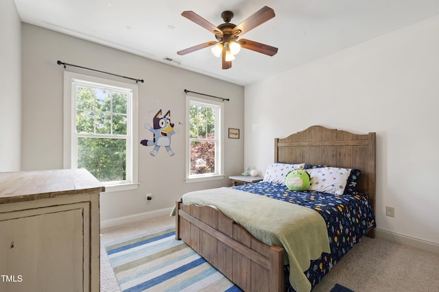 101 Eden Glen Dr, Holly Springs, NC 27540 - bedroom with light carpet, baseboards, and ceiling fan