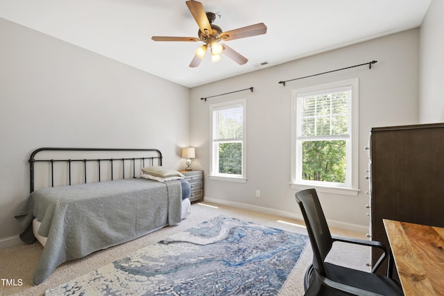 101 Eden Glen Dr, Holly Springs, NC 27540 - bedroom with baseboards, carpet floors, and ceiling fan