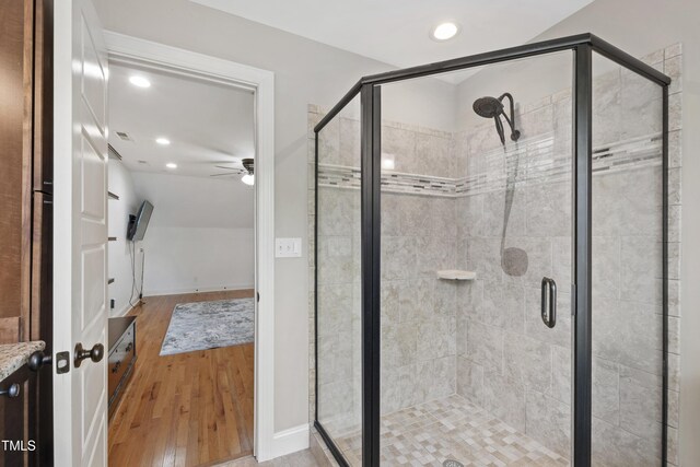 101 Eden Glen Dr, Holly Springs, NC 27540 - bathroom featuring a ceiling fan, a shower stall, wood finished floors, recessed lighting, and baseboards
