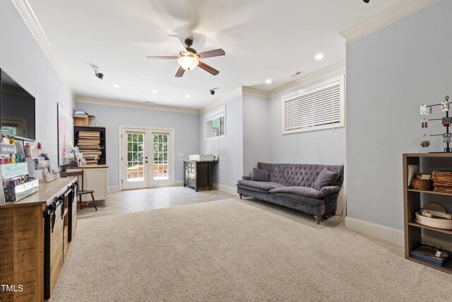 101 Eden Glen Dr, Holly Springs, NC 27540 - living area featuring a ceiling fan, crown molding, light carpet, recessed lighting, and baseboards
