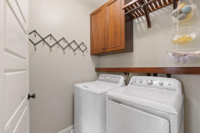 101 Eden Glen Dr, Holly Springs, NC 27540 - laundry area featuring cabinet space and washer and clothes dryer