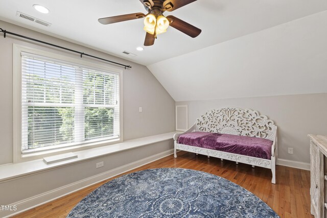 101 Eden Glen Dr, Holly Springs, NC 27540 - bedroom with lofted ceiling, wood finished floors, baseboards, a ceiling fan, and recessed lighting