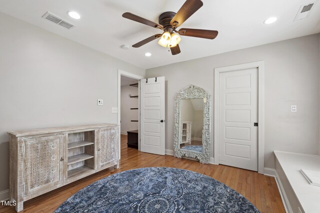 101 Eden Glen Dr, Holly Springs, NC 27540 - bedroom featuring wood finished floors, recessed lighting, baseboards, and a ceiling fan