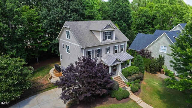 101 Eden Glen Dr, Holly Springs, NC 27540 - view of front of home with roof with shingles and a porch
