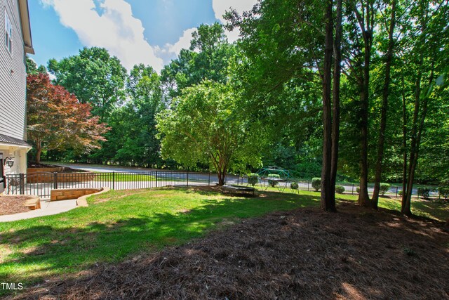 101 Eden Glen Dr, Holly Springs, NC 27540 - view of yard featuring view of scattered trees