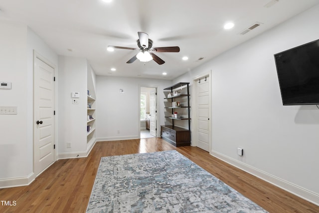101 Eden Glen Dr, Holly Springs, NC 27540 - bedroom featuring wood finished floors, baseboards, and recessed lighting
