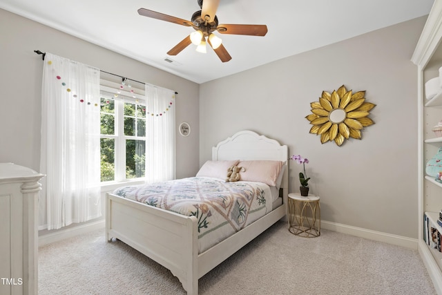 101 Eden Glen Dr, Holly Springs, NC 27540 - carpeted bedroom with baseboards and ceiling fan