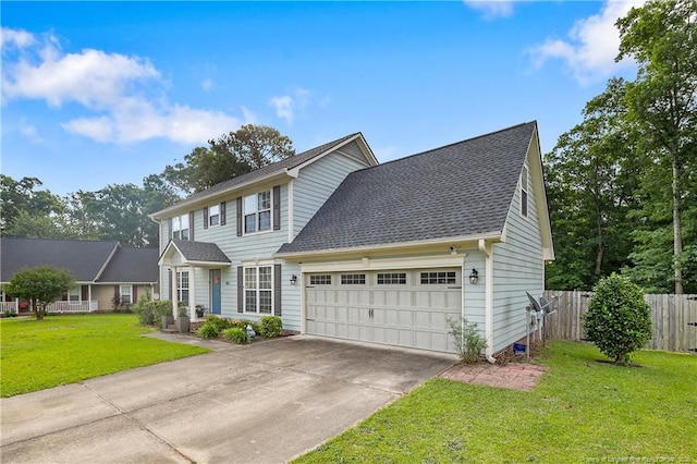 101 Quiet Cv, Raeford, NC 28376 - view of front of house with a garage, driveway, and roof with shingles