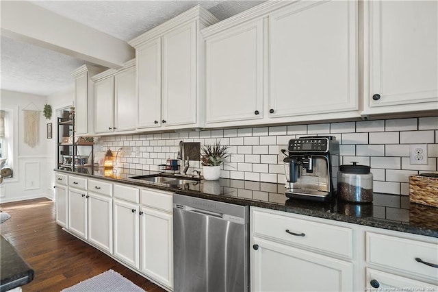 101 Quiet Cv, Raeford, NC 28376 - kitchen with dishwasher, a sink, a textured ceiling, dark wood finished floors, and backsplash