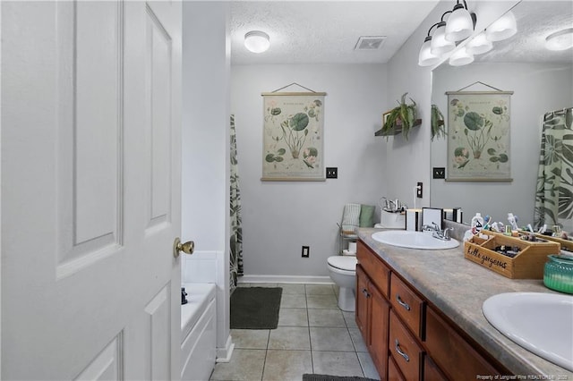 101 Quiet Cv, Raeford, NC 28376 - full bath featuring a textured ceiling, double vanity, toilet, a shower with shower curtain, and tile patterned floors