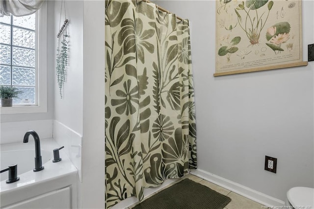 101 Quiet Cv, Raeford, NC 28376 - full bath featuring plenty of natural light, tile patterned floors, toilet, and curtained shower