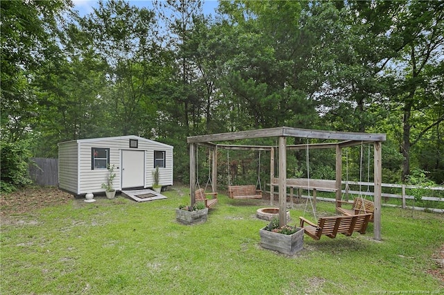 101 Quiet Cv, Raeford, NC 28376 - view of yard with a vegetable garden and view of scattered trees