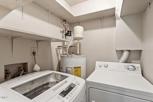 2010 Quaker Lndg Unit 102, Raleigh, NC 27603 - washroom with washer and dryer and electric water heater