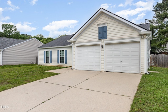 503 Kinship Ln, Apex, NC 27502 - view of front facade featuring driveway, a shingled roof, and an attached garage