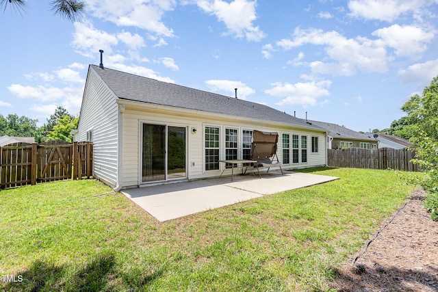 503 Kinship Ln, Apex, NC 27502 - back of house featuring a patio area and roof with shingles