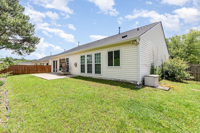 503 Kinship Ln, Apex, NC 27502 - rear view of house featuring a patio