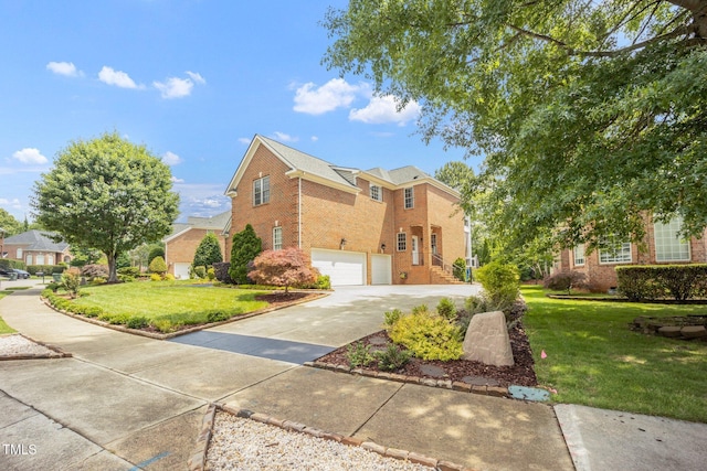 12140 Pawleys Mill Cir, Raleigh, NC 27614 - view of front of house with brick siding, driveway, a garage, and a front yard