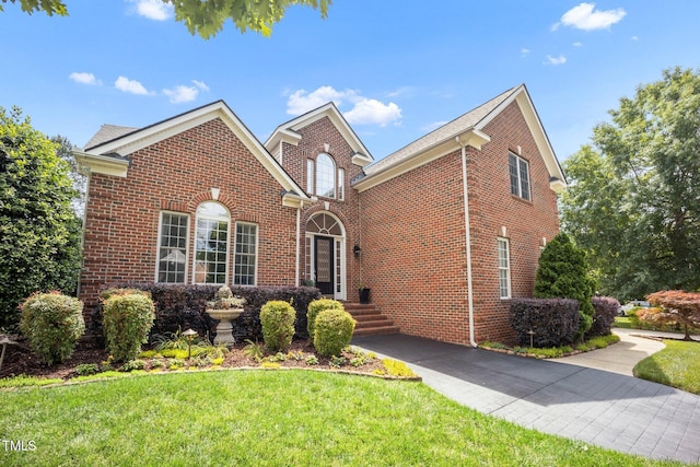 12140 Pawleys Mill Cir, Raleigh, NC 27614 - view of front of property featuring brick siding and a front yard