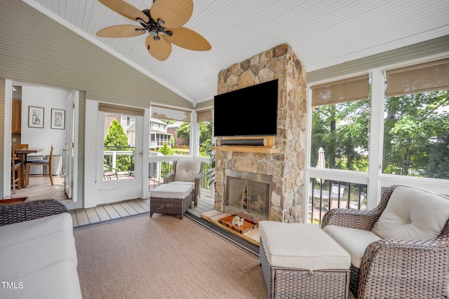 12140 Pawleys Mill Cir, Raleigh, NC 27614 - sunroom with a fireplace, vaulted ceiling, plenty of natural light, and a ceiling fan
