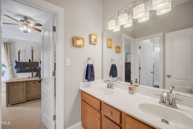 12140 Pawleys Mill Cir, Raleigh, NC 27614 - full bath with double vanity, ceiling fan, and baseboards