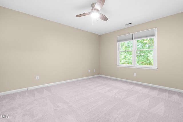 6104 New Market Way, Raleigh, NC 27609 - spare room featuring light colored carpet, a ceiling fan, and baseboards