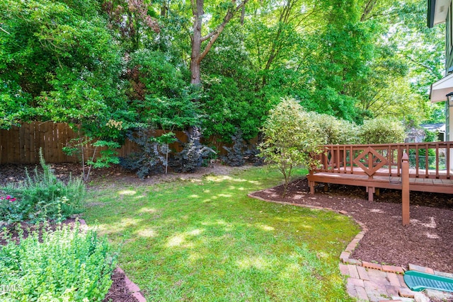 6104 New Market Way, Raleigh, NC 27609 - view of yard with a wooden deck
