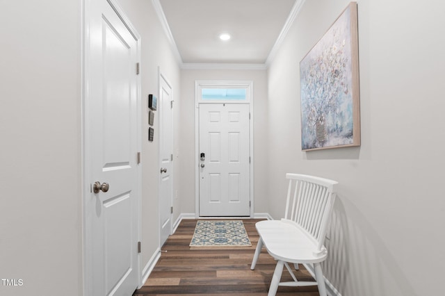 1615 Emory Ridge Way, Wake Forest, NC 27587 - entryway featuring dark wood-style floors, ornamental molding, and baseboards
