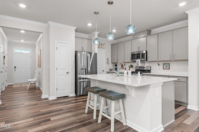 1615 Emory Ridge Way, Wake Forest, NC 27587 - kitchen featuring stainless steel appliances, gray cabinets, backsplash, light countertops, and dark wood-type flooring