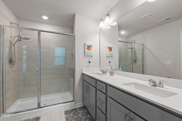 1615 Emory Ridge Way, Wake Forest, NC 27587 - bathroom with double vanity, a shower stall, and recessed lighting