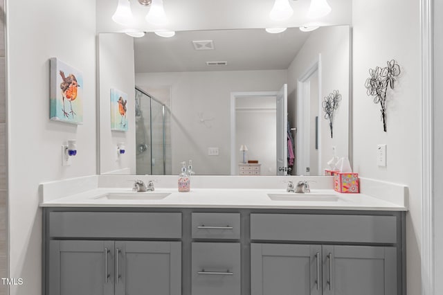 1615 Emory Ridge Way, Wake Forest, NC 27587 - full bathroom featuring double vanity and a shower stall