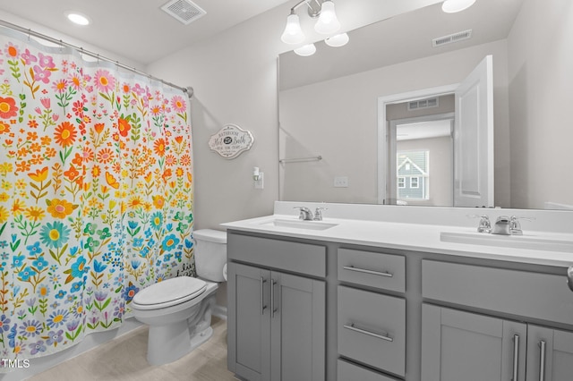 1615 Emory Ridge Way, Wake Forest, NC 27587 - full bath featuring toilet, double vanity, and a shower with curtain