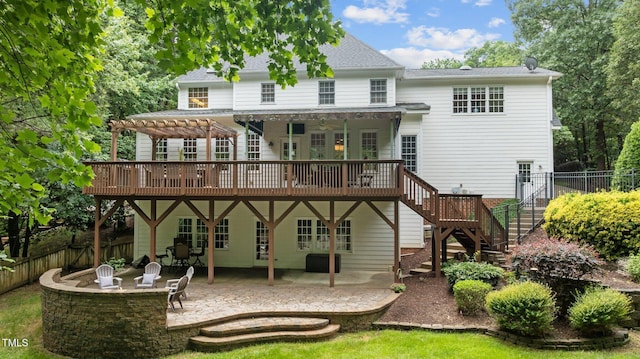 1332 Kinsdale Dr, Raleigh, NC 27615 - back of property with a deck, stairs, a patio area, and a pergola