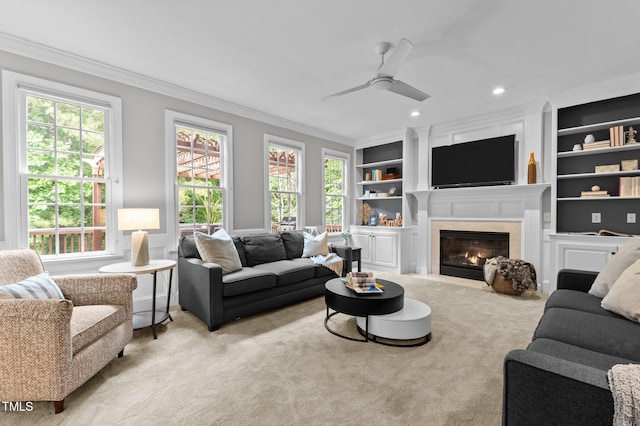 1332 Kinsdale Dr, Raleigh, NC 27615 - living area with ornamental molding, plenty of natural light, carpet flooring, a high end fireplace, and recessed lighting