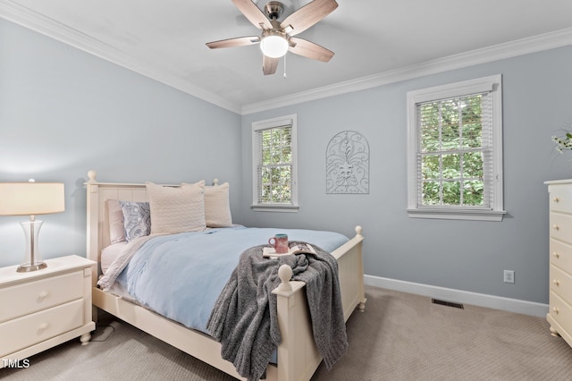 1332 Kinsdale Dr, Raleigh, NC 27615 - carpeted bedroom featuring ornamental molding, baseboards, and ceiling fan