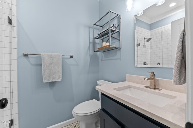1332 Kinsdale Dr, Raleigh, NC 27615 - bathroom with toilet, vanity, a tile shower, and ornamental molding