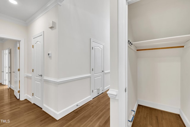 5121 Ten Point Trl, Wake Forest, NC 27587 - corridor with wood finished floors, baseboards, and crown molding