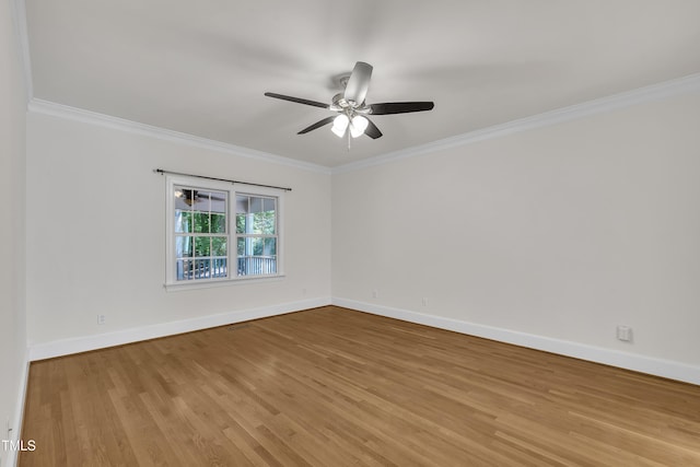 5121 Ten Point Trl, Wake Forest, NC 27587 - unfurnished room with wood finished floors, crown molding, ceiling fan, and baseboards