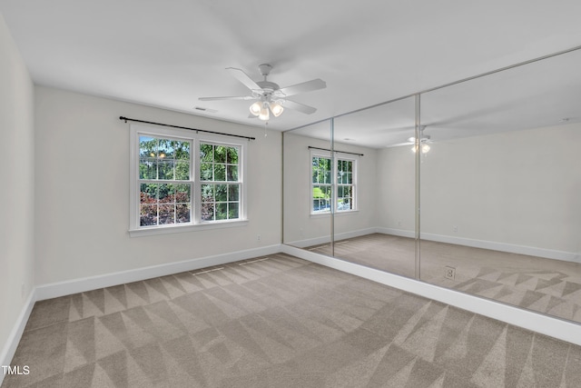 5121 Ten Point Trl, Wake Forest, NC 27587 - unfurnished bedroom featuring carpet, baseboards, and a closet