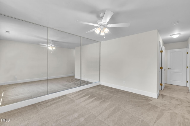 5121 Ten Point Trl, Wake Forest, NC 27587 - unfurnished bedroom featuring carpet floors, a closet, baseboards, and ceiling fan