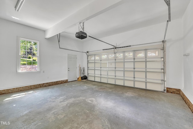 5121 Ten Point Trl, Wake Forest, NC 27587 - garage with a garage door opener and baseboards