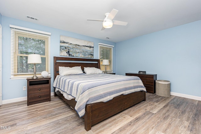 139 Hollyhock Ct, Durham, NC 27713 - bedroom featuring wood finished floors, baseboards, and ceiling fan