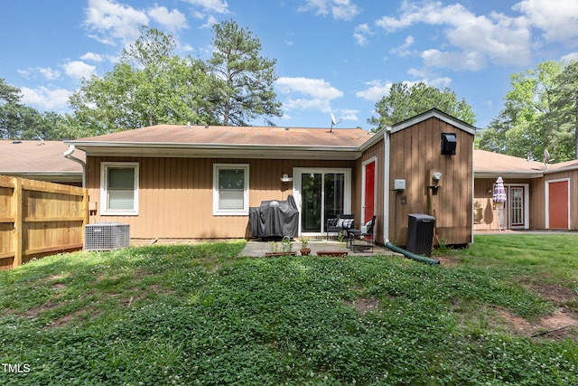 139 Hollyhock Ct, Durham, NC 27713 - back of house featuring central air condition unit and a patio