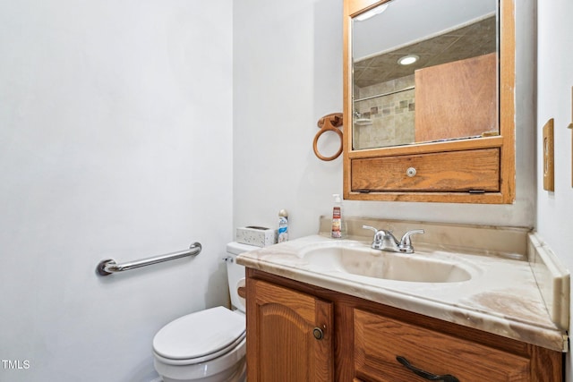 102 Pine St, Dunn, NC 28334 - bathroom featuring toilet, vanity, and a shower