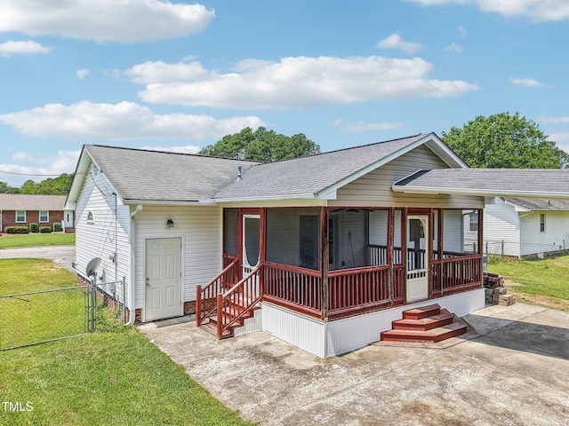 102 Pine St, Dunn, NC 28334 - view of front of property featuring roof with shingles and a gate