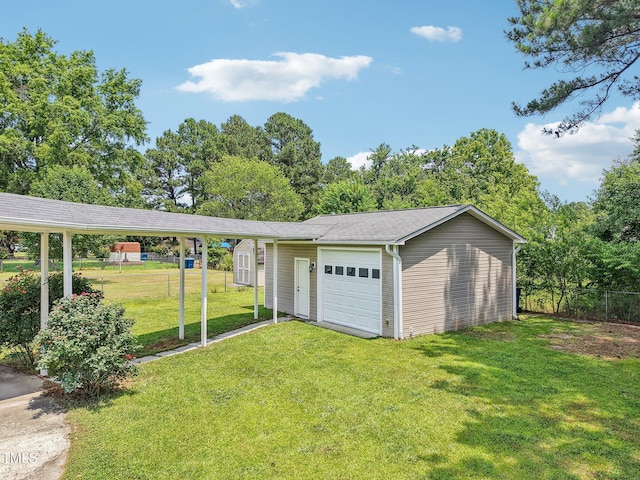 102 Pine St, Dunn, NC 28334 - garage featuring a detached garage and a storage unit