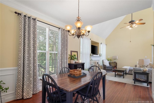 15 London Way, Spring Lake, NC 28390 - dining space with dark wood-type flooring, a chandelier, wainscoting, ceiling fan, and vaulted ceiling
