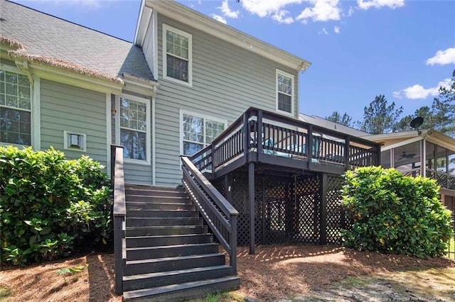 15 London Way, Spring Lake, NC 28390 - rear view of property with stairway, a wooden deck, and roof with shingles