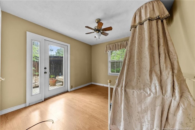 114 Birch Cir, Raeford, NC 28376 - spare room with wood finished floors, baseboards, and a ceiling fan