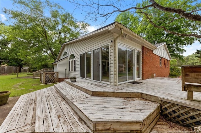 114 Birch Cir, Raeford, NC 28376 - deck featuring a lawn