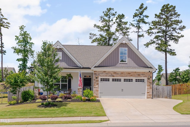 40 Bourne Dr, Franklinton, NC 27525 - craftsman-style home featuring board and batten siding, driveway, roof with shingles, and an attached garage